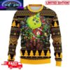 NFL Pittsburgh Steelers x The Grinch Santa Hat Snowflakes Pattern Ugly Sweater For Men And Women